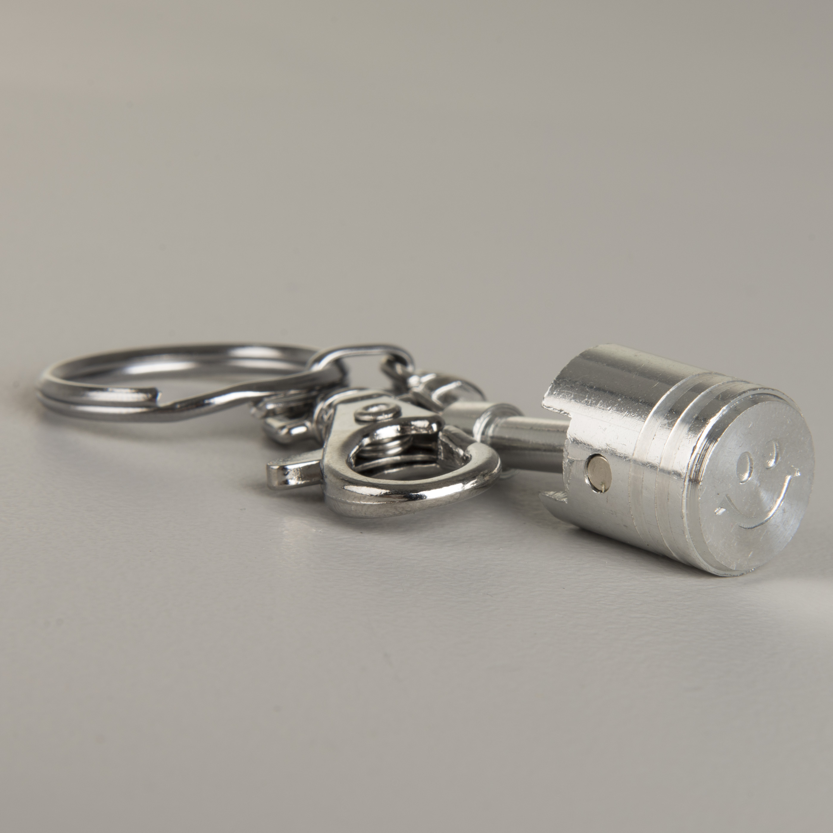 Llavero Booster Pistón